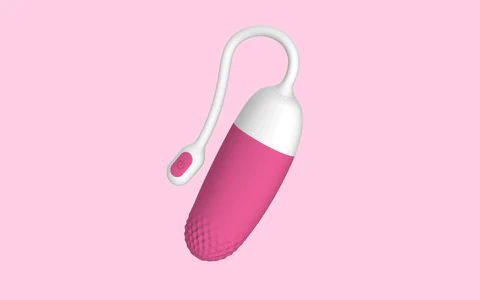 Pink bullet vibrator with a remote-control loop on a pink background.
