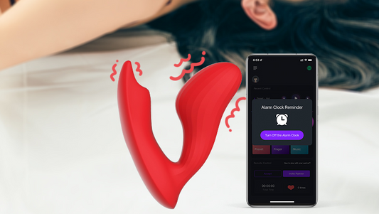 Red wearable vibrator and phone showing an alarm clock reminder.