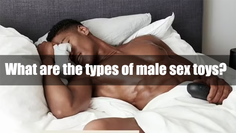 Man lying in bed holding a black massager.