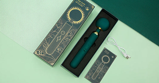 Dark green Magic Zenith wand in its product box.