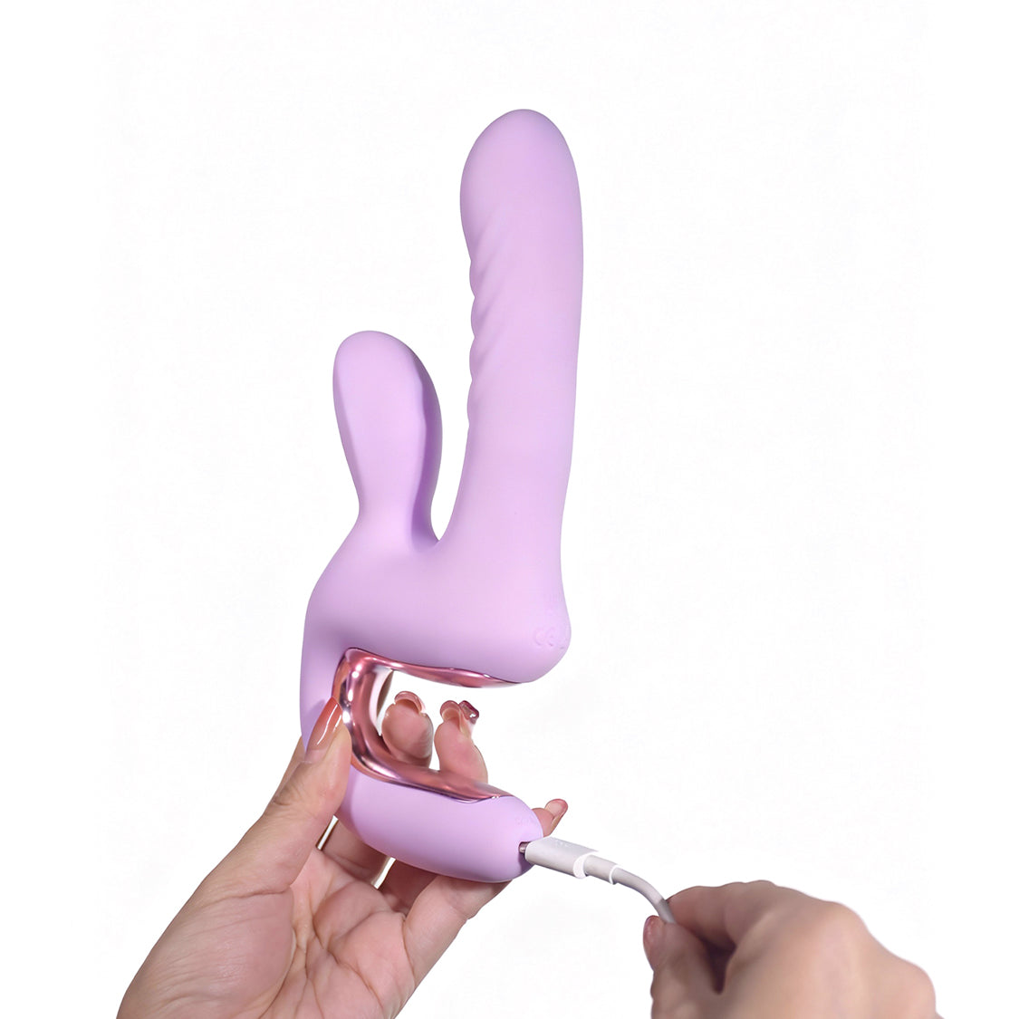 Purple Magic Duet vibrator connected to the included Type-C charging cable