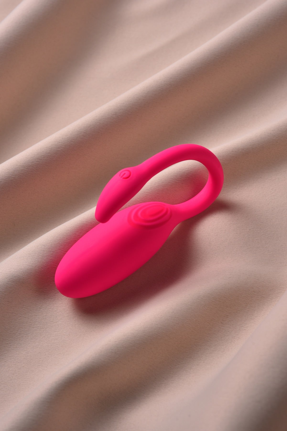 Magic Flamingo wearable app-controlled vibrator on soft fabric