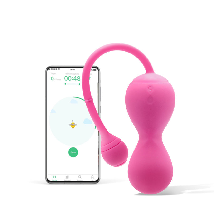 Magic Kegel Master Gen 2 trainer beside its app