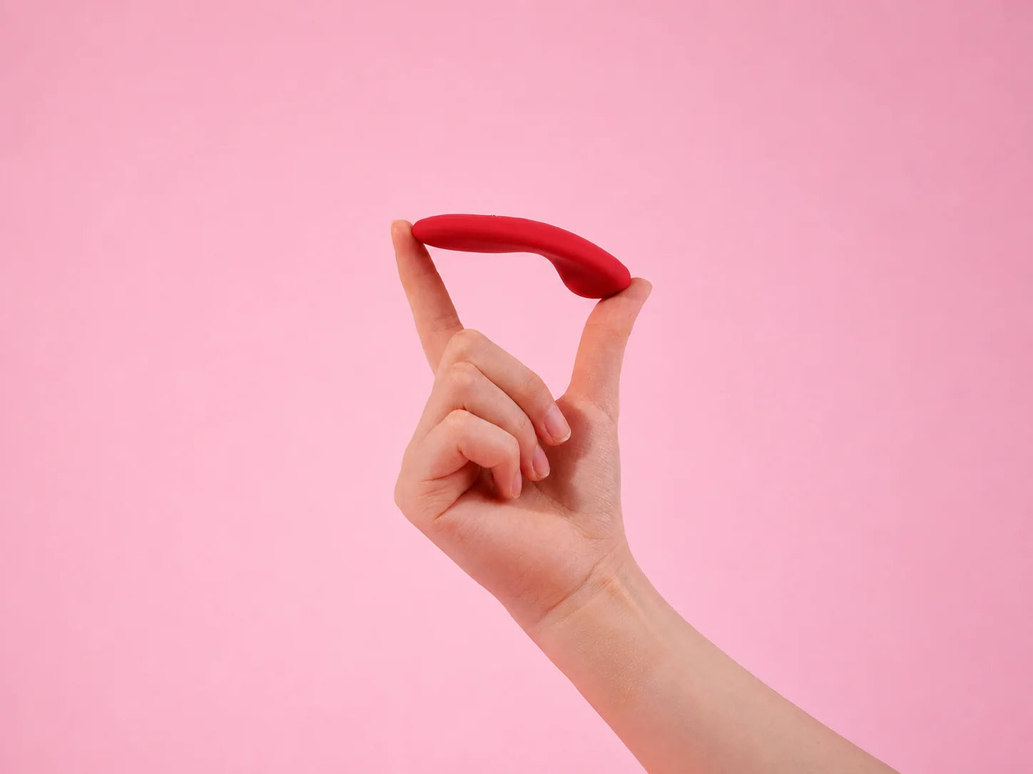 Magic Nyx slim external wearable shown balancing across two fingers