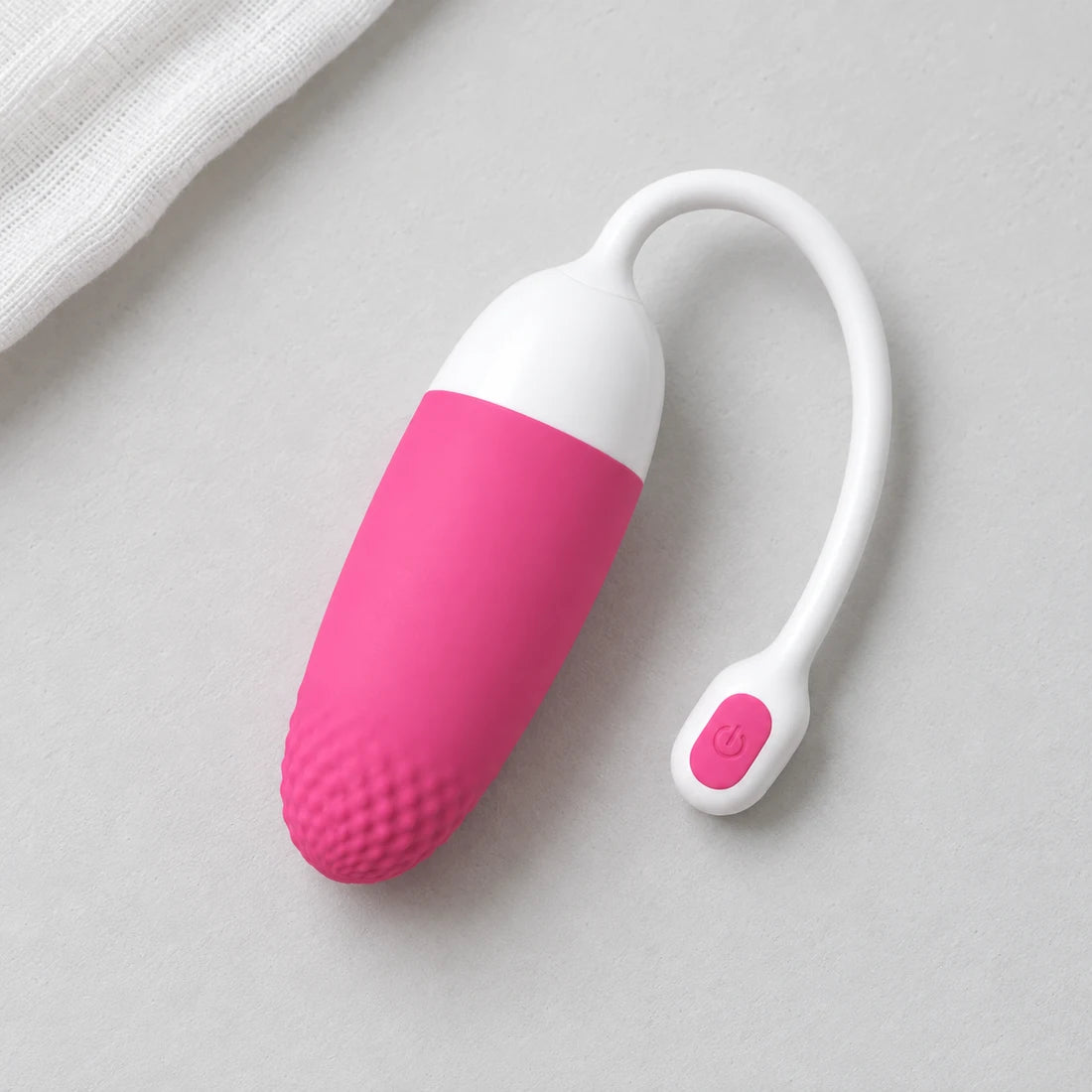 Pink and white Magic Vini showing its two-tone body and textured tip