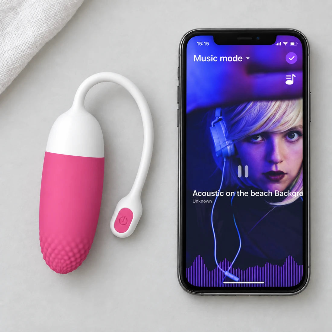Pink and white Magic Vini beside an English Magic Motion Music mode interface illustration
