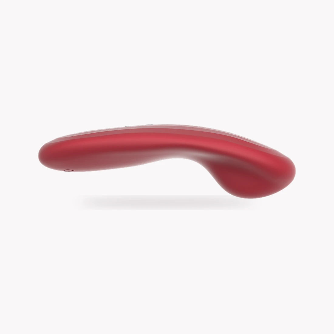 Side profile of red Magic Nyx on a clean soft-white background