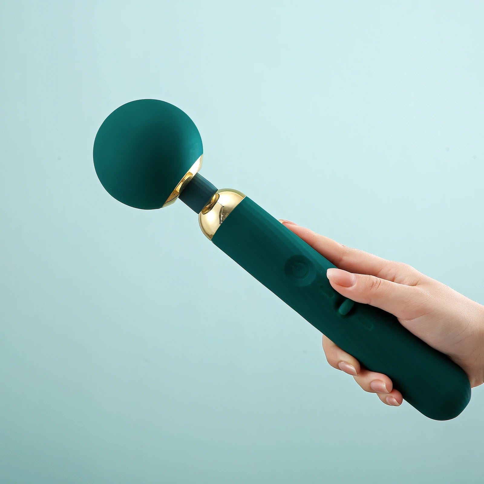Hand using the direct controls on the Magic Zenith wand handle